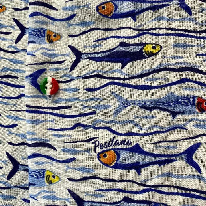 attention to detail cannot be improvised…….
•
•
•
#linenshirt #exclusive #print 
#fish #colors #amalficoast 
#